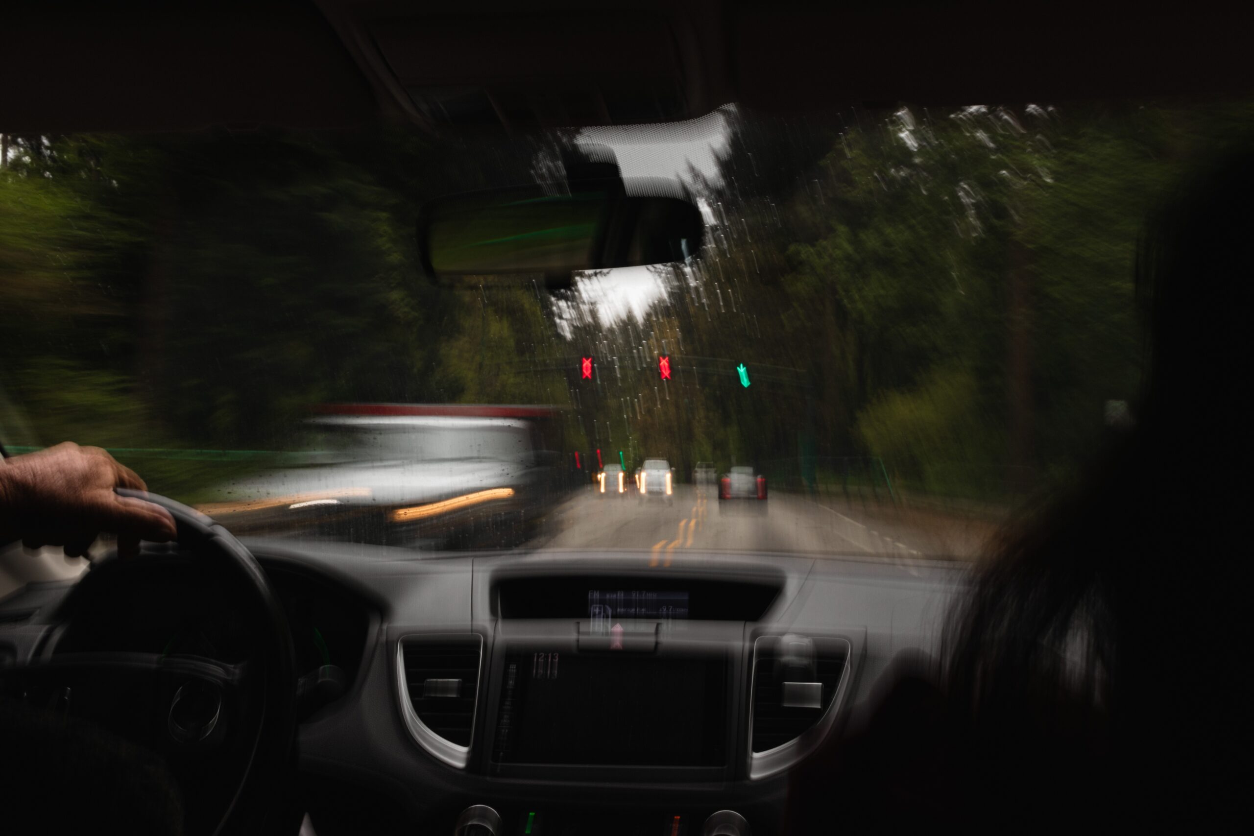 Blurry image of person driving car representing driving under the influence