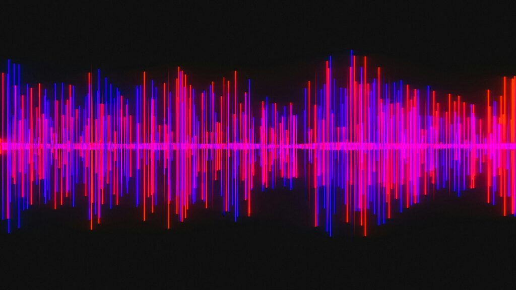 A pink, red, and blue sound wave on a black background to symbolize the audio recording that factored into this case, representing sexual assault appeals.